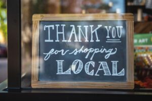 shallow focus photo of thank you for shopping signage seo local
