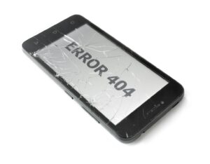 a broken cell phone with the word error 404 on it